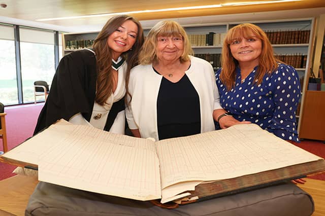 Hannah Clarke, her grandmother Margaret Moloney of Tuam and mother Anne Clarke with the University of Galway student register showing the signature of Hannah’s great-grandmother, Mary C. Whyte