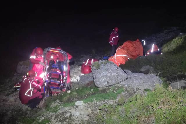 SEMRA volunteers provide assistance to the injured walker
