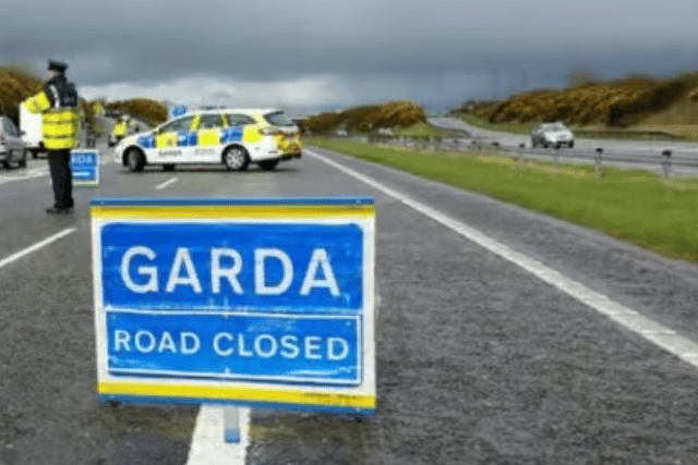 Gardai closing off a motorway road stock image