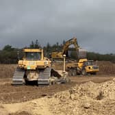 Heavy machines at work on the runway extension at Waterford Airport