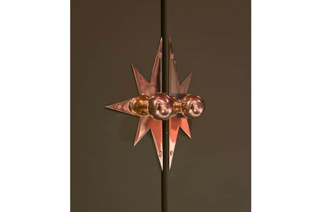 These were originally white-gloss wardrobes from IKEA, which Lia Gold panelled and painted, and then changed the hardware to star ones from Matilda Goad (Lia Gold Interiors/PA)