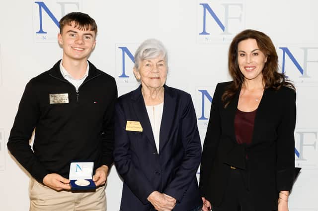 Winning Kilkenny scholar Ted Crowley from Kilkenny College, Carmel Naughton and Minister for Health Jennifer Carroll MacNeill at the 2026 Naughton Foundation Scholarship awards held at Trinity Business School, Trinity College Dublin