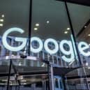 The Google logo displayed within an office building