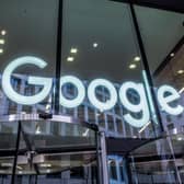 The Google logo displayed within an office building