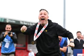Cambridge manager Neil Harris celebrates