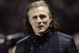 Gareth Ainsworth looks on