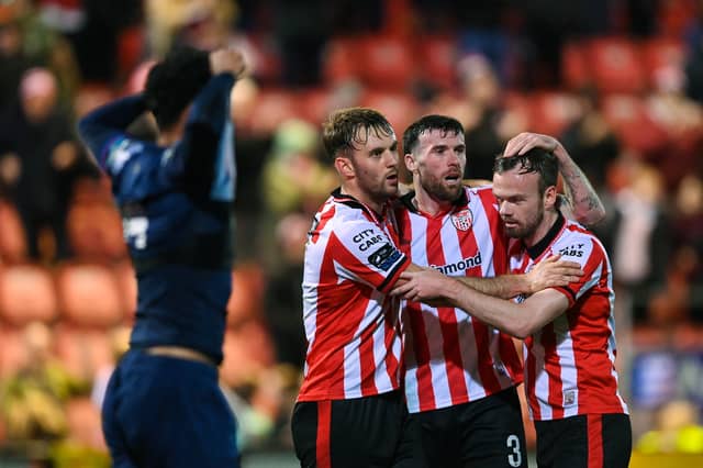 Derry City players, from left, Jamie Stott, Patrick McClean and Cameron Dummigan celebrate a clearance during Monday night's game against St Patrick's Athletic at Brandywell.