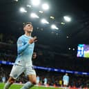Manchester City’s Phil Foden celebrates scoring a hat-trick