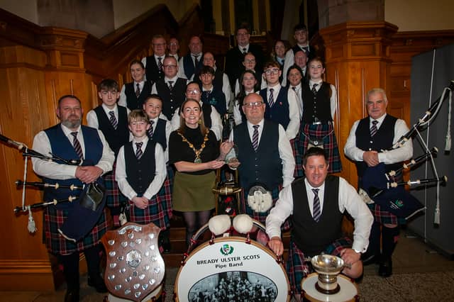 The Mayor of Derry City and Strabane District Council, Grace Ui Niallais pictured at the Guildhall on Tuesday evening making a presentation to the Bready Ulster Scots Pipe Band on being crowned world champioins 2026 in Grade 4B at the World Pipe Band Championships, and for securing the title of World Champion Drum Corps, Grade 4B.