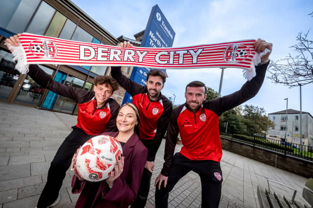 Hannah Rooney, Translink Assistant Route Manager for Northern Area Rail, pictured at the North West Transport Hub with Derry City FC players Nick Twisk, Ellis Chapman and Patrick McClean.
