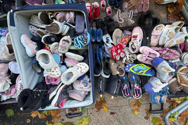 Powerful image: Campaigners with the Walk in our Shoes campaign left dozens of tiny children’s shoes outside Leinster House, to symbolise the childhoods that campaigners believe are being lost or damaged as a result of decisions made in Ireland’s Family Courts. For safety and confidentiality reasons, a decision was taken not to photograph those who descended on Leinster House.