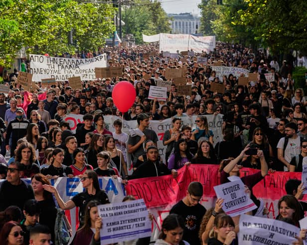 Protesters take part in a rally in Athens, Greece