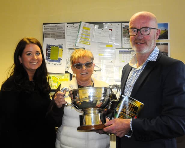 Leitrim GAA County Board officials Aoife Keenan, Attracta O’Reilly and Declan Bohan pictured with the Fenagh Cup - who will bring it home next Saturday Picture: Willie Donnellan