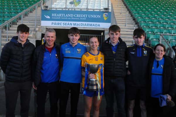 ​Glencar Manorhamilton captain Aoife Gilmartin celebrates with her family after last Saturday's Leitrim LGFA SFC Final in Heartland Credit Union Pairc Sean Mac Diarmada Picture: Willie Donnellan