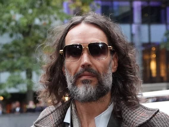 Russell Brand outside court