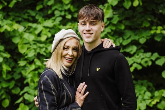 Anne with her son Dmitry, who helped inspire the new book.