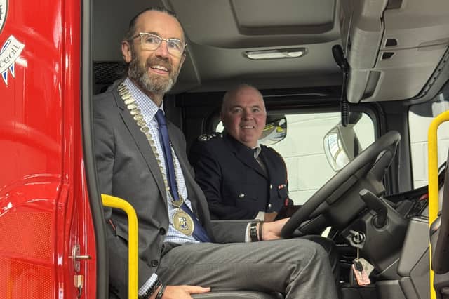 Cathaoirleach of Monaghan County Council, Cllr Aidan Campbell, and Chief Fire Officer, Dermot Brannigan, pictured in the cab of Monaghan County Council's new Class B Fire Appliance following its official handover at Monaghan Fire Station