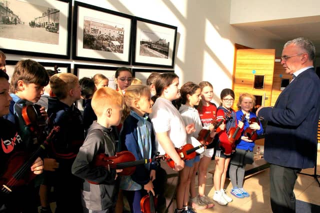 Minister Dara Calleary speaks to young musicians from Music Generation Mayo Erris Strings Project at Aras Inis Gluire