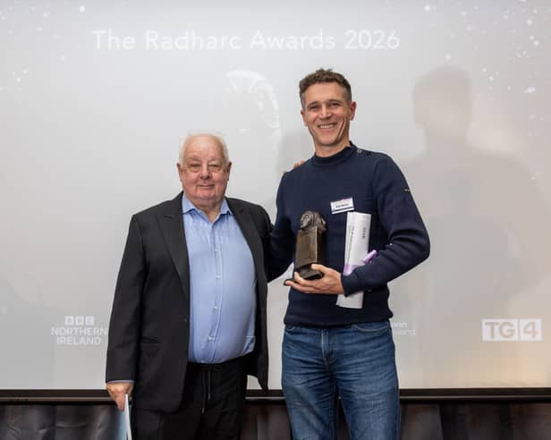 The Radharc Awards 2026 Trophy presented by Jim Sheridan for TV documentary 'Listen to the Land Speak'. Pictured collecting the award is close friend to late Manchán Magan, Eoin Warner. 
