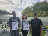 Victor Nwamkwo and Breda Haden with awards alongside Head Chef Andri Peilouw