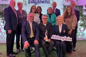 Abbeyleix TidyTowns collecting their 2026 award as Ireland's tidiest small town, from Minister Dara Colleary in Croke Park. 