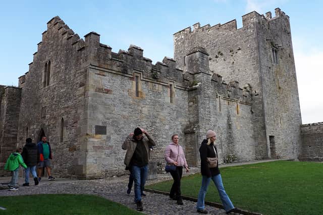 Tourists enjoying a visit to Cahir Castle this week