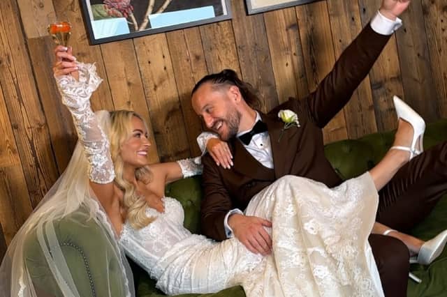 Tom Morrissey and bride Elaine Dolan toast their nuptials