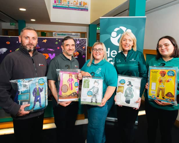 Dan Doherty and John Allen of Click Energy alongside Natasha Burke, Family Support Hub Coordinator, Mary Breslin, Deputy Director of Health for Life, and Katie Bogle, Student Social Worker.