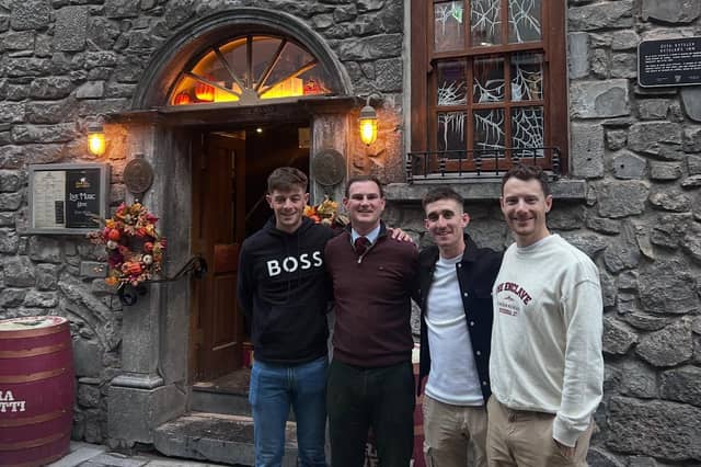 Irish cycling stars Sam Bennett, Eddie Dunbar and Dillon Corkery pictured during their visit to Kyteler's Inn in Kilkenny with Director of Kyteler’s Inn, JD Flynn