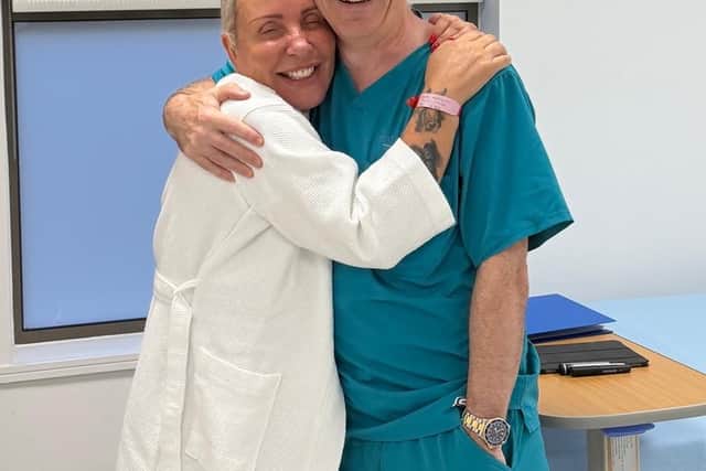 Deby with consultant plastic surgeon Gerard Lambe (Aga Mortlock/Reflect Clinic/PA Real Life)