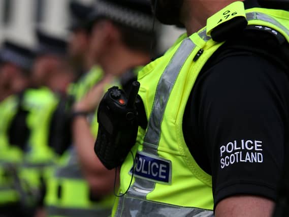 Police Scotland officers wearing high-vis jackets