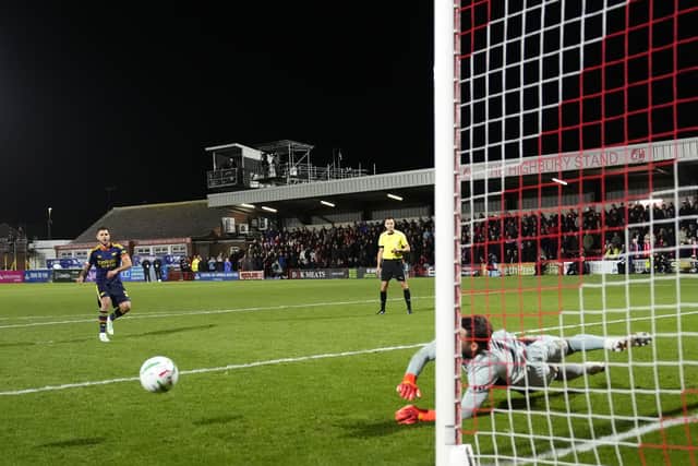 Jay Lynch denies Bruno Guimaraes to help Fleetwood beat Arsenal on penalties (Nick Potts/PA)