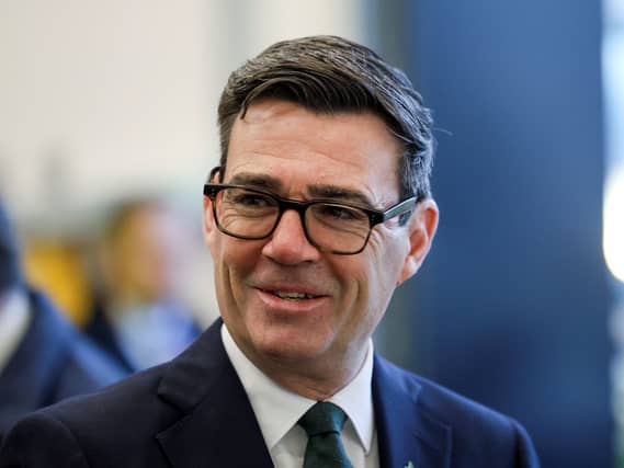 A head-and-shoulders photograph of Prime Minister Andby Burnham against a blurry background