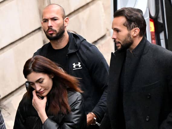 Andrew and Tristan Tate outside a court in Romania