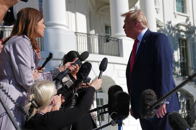 Donald Trump speaking to reporters outside the White House (Julia Demaree Nikhinson/PA)