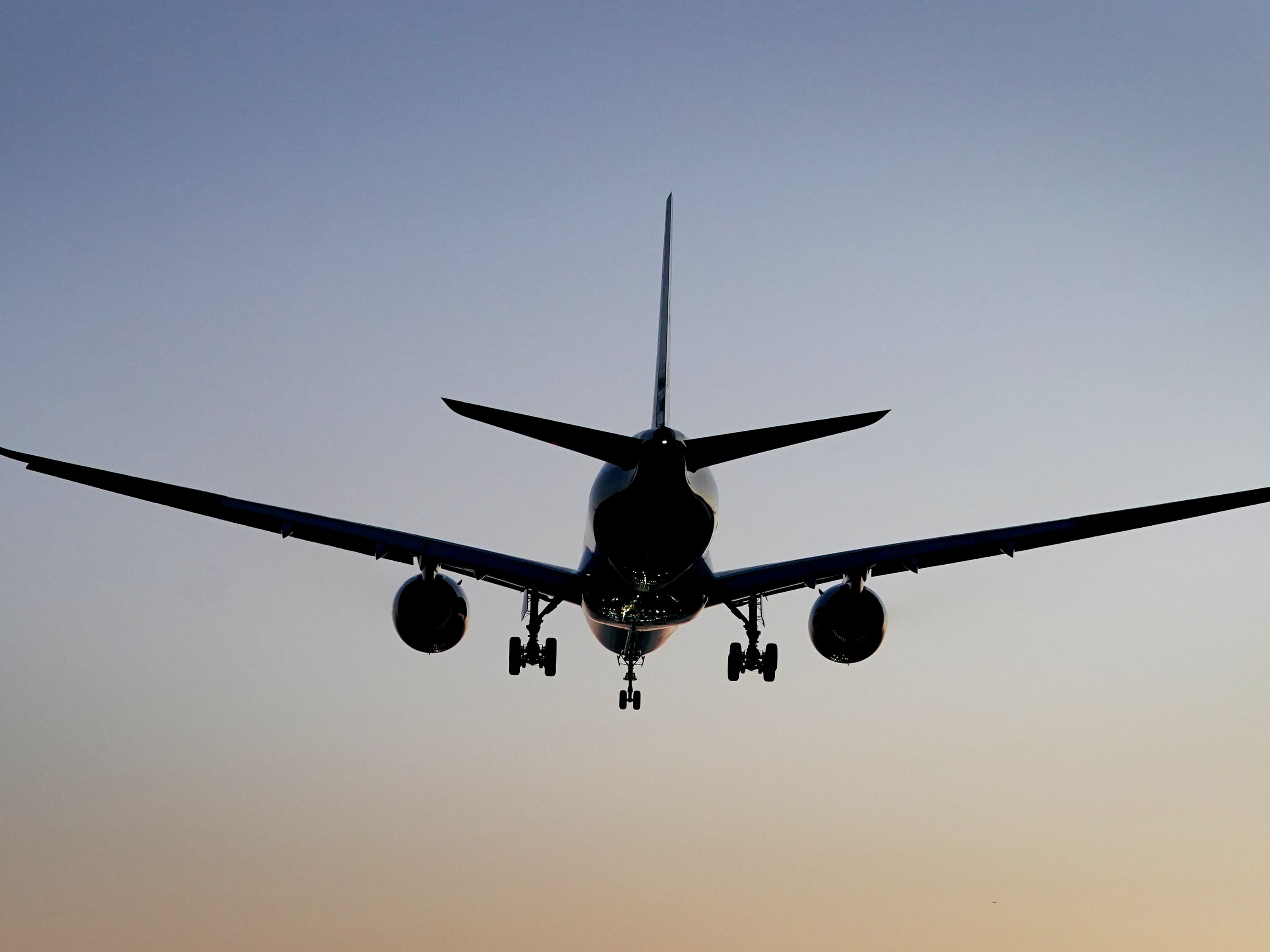 Silhouette of a plane in the sky