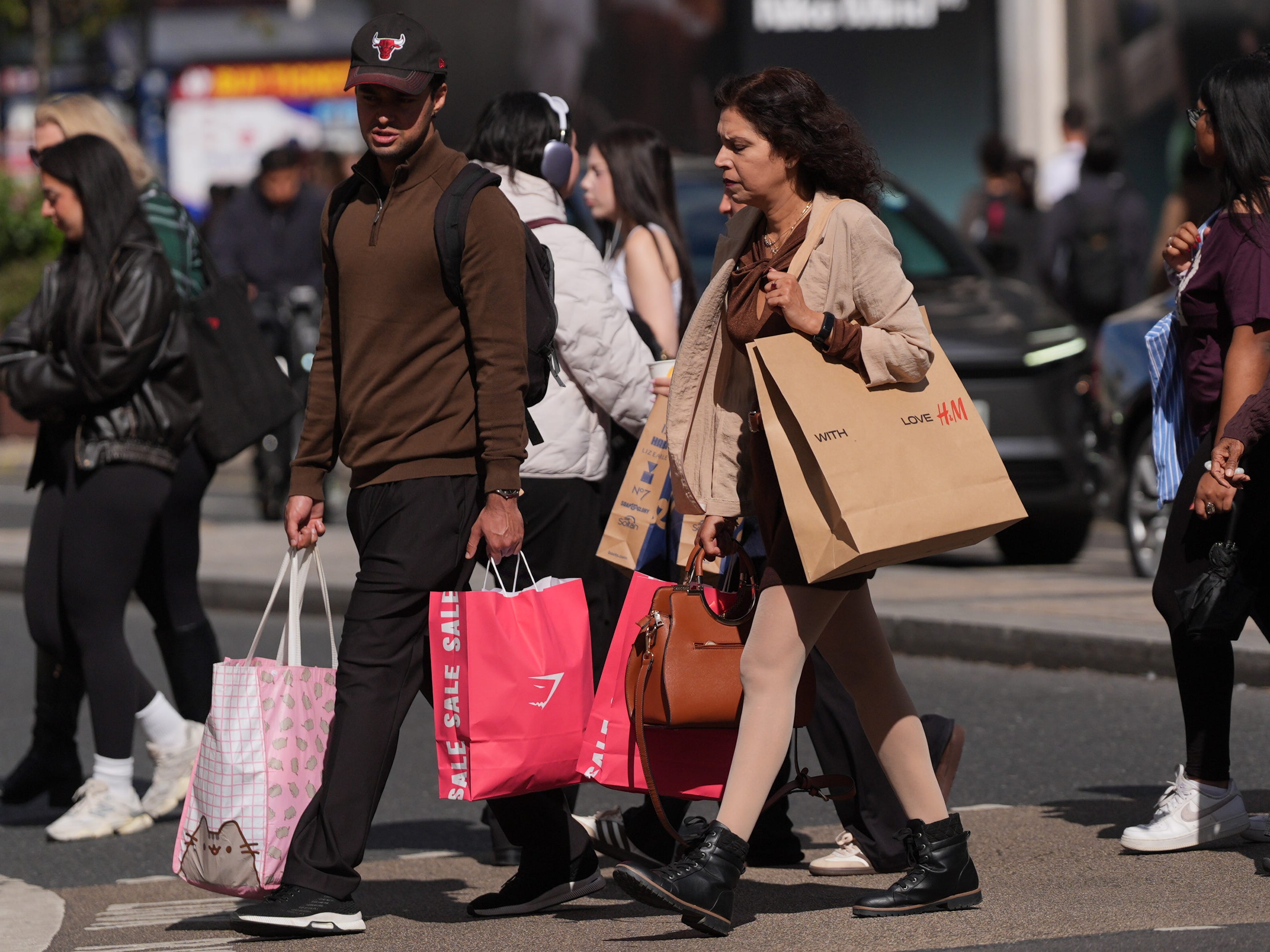 UK retail sales drop after warm weather hits winter clothing demand