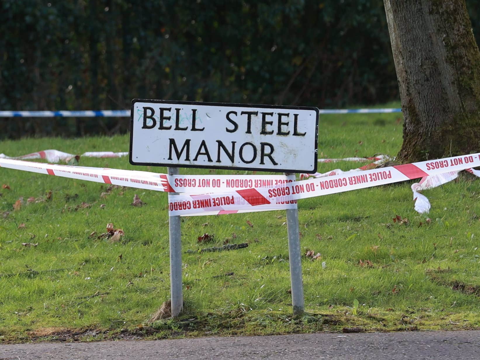 Police tape at the scene of the shooting in the Bell Steel Manor area of Dunmurry, west Belfast