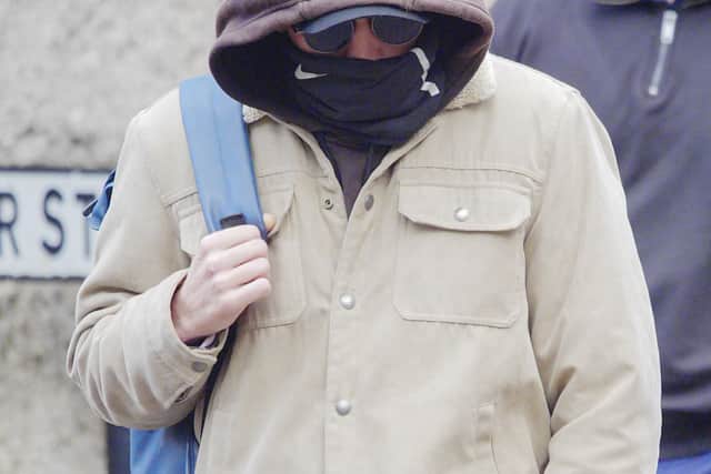 Connor Sanderson-Doyle (with hood) arriving at Winchester Crown Court (Ben Birchall/PA)