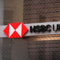 HSBC profits surge by a third as cost-cutting exceeds target