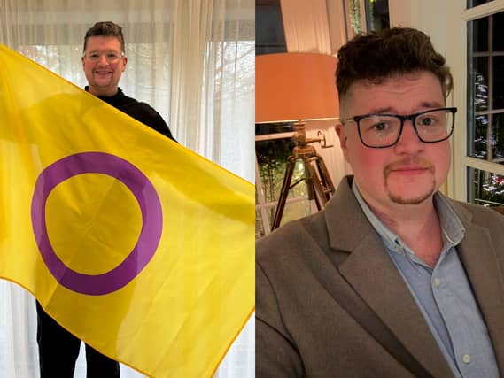 John with the intersex flag