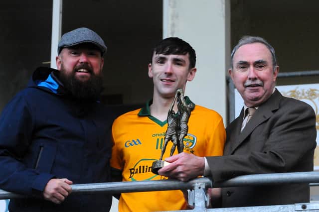 Cillian & Gabriel Cronin present Tom Prior with the Cronin Dental Laboratories Man of the Match award after the Connacht Gold Leitrim SFC Final Replay last Sunday Picture: Willie Donnellan