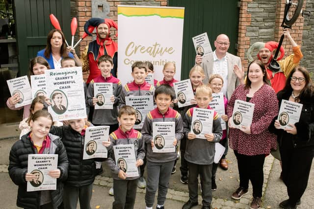 Raphoe Central National School children with copies of Reimagining Granny's Wonderful Chair