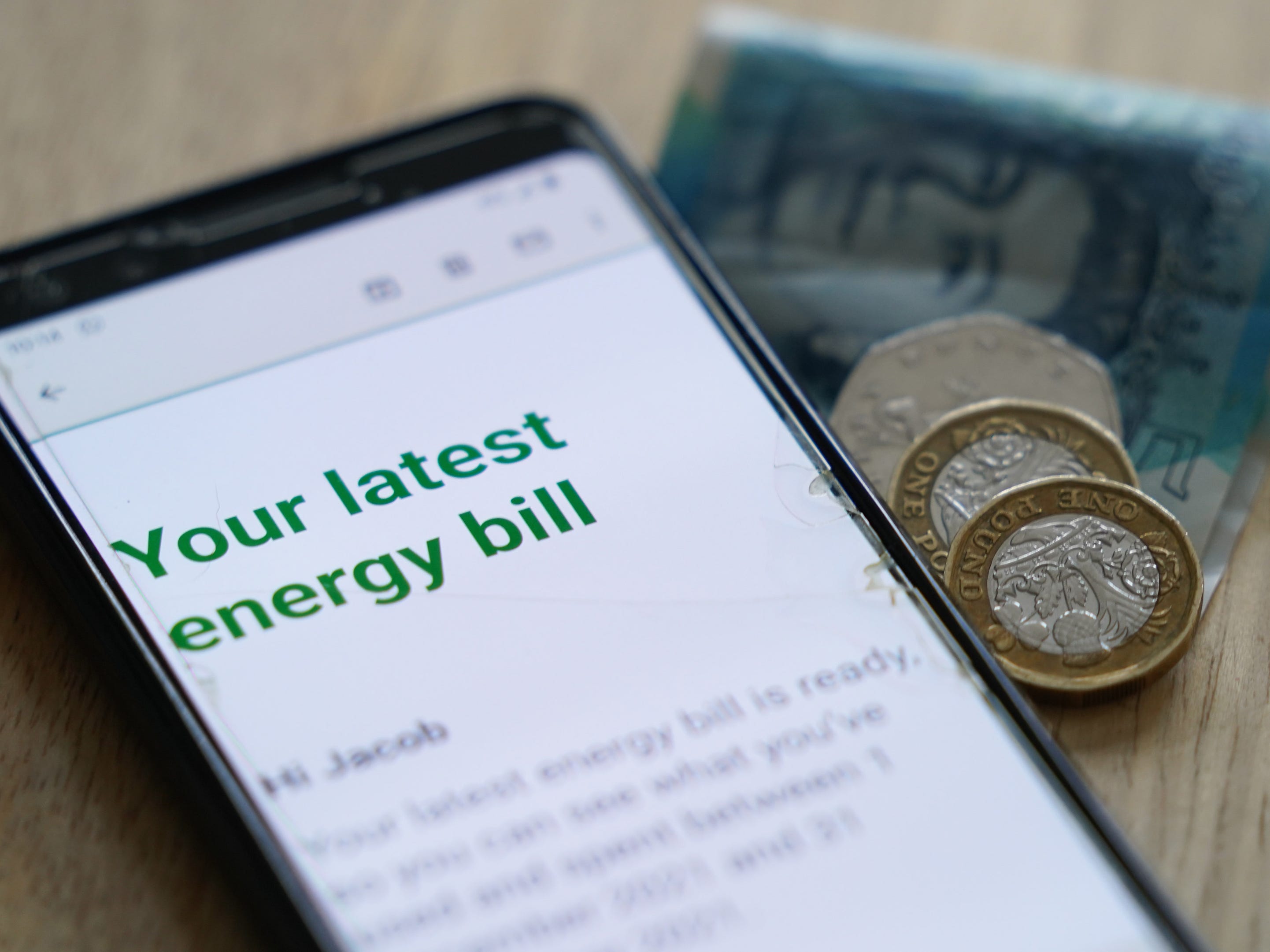 A phone showing an energy bill