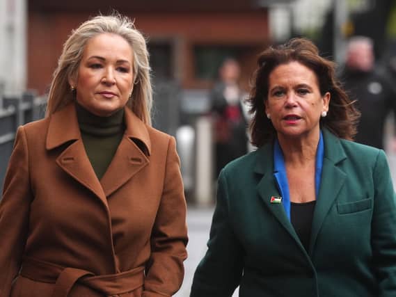 Michelle O'Neill, left, and Mary Lou McDonald in the street