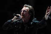 Bono performing on stage