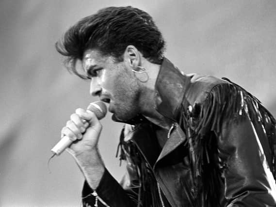 George Michael performs at Wembley Stadium