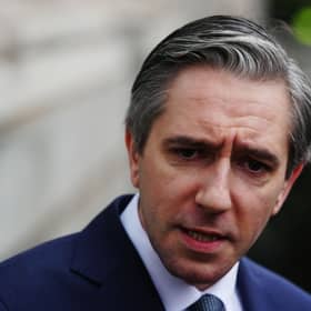 Headshot of Simon Harris speaking