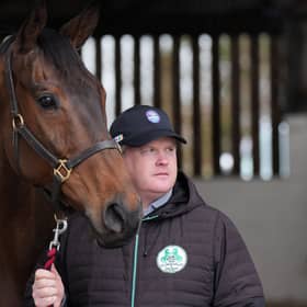 Trainer Gordon Elliott and Romeo Coolio at his stables at Cullentra House