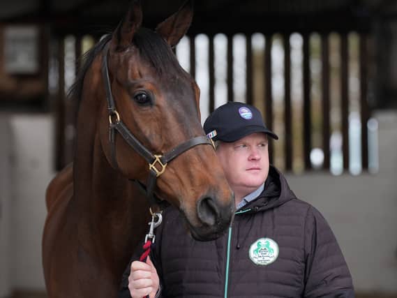 Trainer Gordon Elliott and Romeo Coolio at his stables at Cullentra House